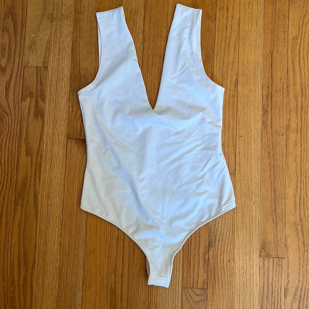 NWOT Free People White Deep V Thong Bodysuit